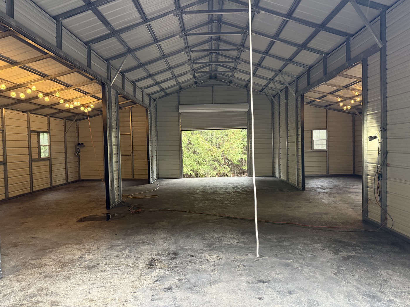 Event center interior with string lights and open layout