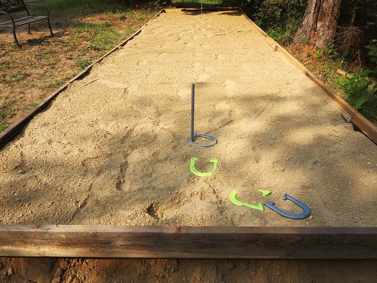 Horseshoe pit for outdoor games